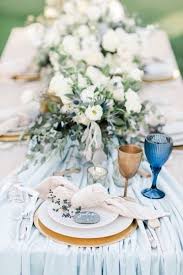Elegant Wedding Centerpiece Idea Light Blue Table Runner With White Flower And Greenery Centerpiec Blue Themed Wedding Beachside Wedding Classic Blue Wedding