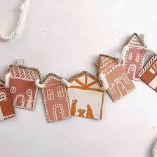 Olive Eve Co On Instagram How Adorable Is This Diy Gingerbread House Garland By Sunny And Gold The Added Tinsel With These Color Tones Are So Dreamy