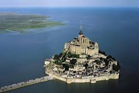 Dazzling Supertide Envelops France S Mont Saint Michel Places To Travel Mont Saint Michel France Places To Go