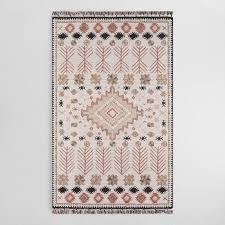 Black And Tan Area Rug 8x10 A Southwestern Motif In Dusty Spice Red Pink Black And Tan Against An Ivory Ground Gives Our Tufted Rug Hand Tufted Rugs Beige Area Rugs Area Rug Collections