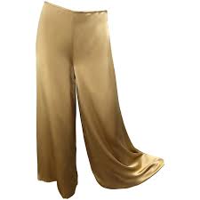 Metallicdescription:complement your praise outfit with these metallic silver or metallic gold palazzo pants. Reem Acra Liquid Gold Silk Size 6 8 Wide Leg Metallic Trousers Pants For Sale At 1stdibs