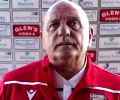 Watch Arbroath boss Dick Campbell get STRUCK by sponsors' board as gale  force Gayfield gusts strike again in video clip