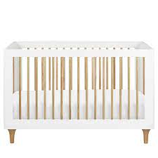The brushed gold inlays give this stunner an elevated metallic touch, while the higher sheen on the painted white finish adds a more modern feel. Modern White Cribs Allmodern