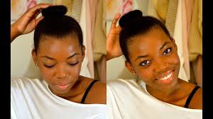 Loosely twist your hair around the doughnut form. How To Do A Sock Bun On Every Hair Type Stylecaster