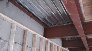 Steel Beams Over Garage Attached To Concrete Wall With Qdeck Above And Stud Wall At Concrete Wall Steel Beams Stud Walls Timber Frame