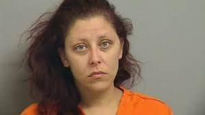 Woman arrested after hitting husband with truck during argument, police say