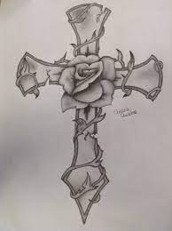 Begin by drawing a spiral to form the center of the flower, with additional curved lines outlining the petals. Fantasy Cross Rose Pencil Drawing Tattoo Art Drawings Tattoo Design Drawings Cross Drawing