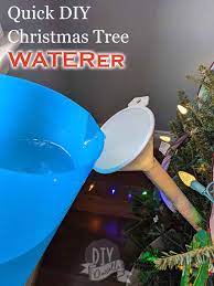 How To Water A Christmas Tree With Less Mess Christmas Tree Water Christmas Tree Watering System Christmas Tree