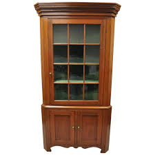 Cherry wood china and display cabinets. American Primitive Colonial Cherrywood Wavy Glass Corner Cupboard China Cabinet For Sale At 1stdibs