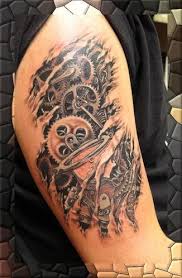 Gear Tattoo Designs Biomechanical Gear Tattoo Gear Tattoo Biomechanical Tattoo Mechanic Tattoo We have done a survey on the net, flower tattoos are. gear tattoo designs biomechanical