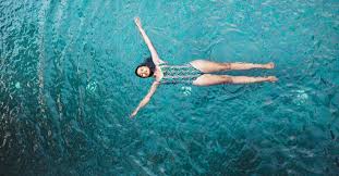 Periods Shouldn T Keep You Out Of The Water Here S What To Do In 2020 Psychological Symptoms Healthline Water