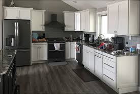 Maybe you would like to learn more about one of these? White Kitchen Cabinets With White Laminate Countertops Novocom Top