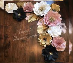 Shown above is a cute red ladybug, hanging out on some pink and white roses! Rose Gold Gold Black And White Paper Flowers With Tropical Leafs White Paper Flowers Paper Flowers Paper Flowers Craft