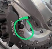 The from brake caliper has a rubber bushimg/dust cover on ...