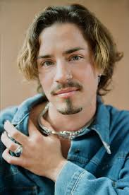 Cal Calamia '23, marathon athlete, poet, educator, and activist, has made  history by winning the nonbinary division at the 2025 TCS London Marathon.  Beyond their athletic feats, Calamia is a leading voice