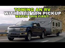 towing a travel trailer rv with a 1 2 ton pickup watch this