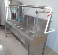 Manual Filling Machines and Packing Tables