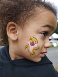 Painting faces at the Franklin County Agricultural Fair