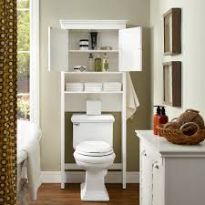 featuring a shelf a cabinet and towel bars on each side our cabinet uses the space above the toilet tan platzsparende badezimmer wc lagerung badezimmer dekor