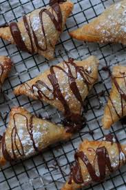 Nutella Cream Cheese Turnovers Recipe Yummly Recipe In 2020 Nutella Cream Cheese Nutella Recipes Desserts