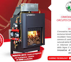 Caldaia a pellet con pannelli solari termici sistema integrato rossato con caldaia a pellet ninfa autopulente e solare temico per riscaldamento a bassa/alta temperatura e produzione di acqua calda sanitaria con pulizia stufe e caldaie a pellet e legna. Carinci Caldaie A Legna Pellet E Cippato Impianti Solari Termici Idraulici Risparmio Energetico