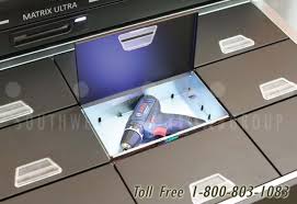 Keep your tools and accessories safe and secure within this freestanding garage storage cabinet with shelves that can be configured to accommodate a range of items from power saws to hammers. Industrial Power Tool Dispensing Lockers Asset Tracking Control Cabinet System