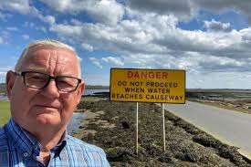 Holidaymakers warned of the dangers of Holy Island tidal causeway after  another car stranded