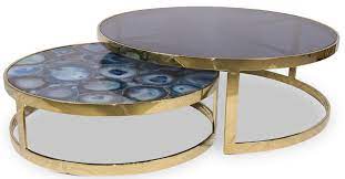 With a spacious coffee table, a console table, and an end table with storage, this set is both stylish and functional. Casa Padrino Luxury Coffee Table Set Blue Gold 2 Round Living Room Tables With Agate Gemstone And Glass Top Luxury Quality Luxury Living Room Furniture