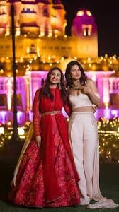 Cousin Sisters Priyanka And Parineeti Chopra Indian Wedding Outfits Designer Dresses Indian Designer Bridal Lehenga Choli