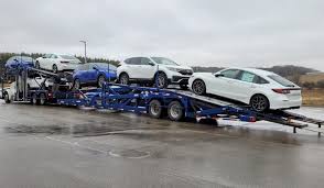Vehicles arrive at Morrie's West Bend Honda