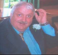 Hi, could someone please clean up this photo of my late dad please?