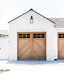 White washed brick with white trim and charcoal gray roof. 20 White Brick Exterior Walls To Envy
