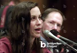 Image of Musician Alanis Morissette testifies, as Napster CEO Hank Berry  looks