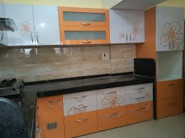 Need some diy inspiration for your kitchen wall cabinets? L Shaped Modular Kitchen Printed Shutters Wall Unit Cabinet Tall Unit Provision For Appliances L Shaped Modular Kitchen Kitchen Units House Outer Design