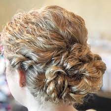 Metal hair combs or a metal hair clip will feel more secure than hair pins. Stunning Wedding Hairstyles For Naturally Curly Hair Southern Living