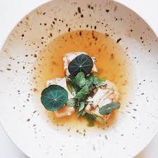 Inspired By The Pho Chef Julien S Take Sees Foie Gras And Japanese Abalone In A Smoked Eel Dashi Consomme Topped With A Medl Theartofplating Medley Nasturtium