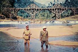 Alec guinness (second from left) in the bridge on the river kwai (1957), directed by david lean. The Real Story Behind The Bridge On The River Kwai