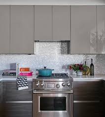 Gray Lacquered Kitchen Cabinets With White And Silver Oval Iridescent Mosaic Tiles Contemporary Contemporary Kitchen Kitchen Cabinet Design Kitchen Cabinets