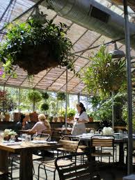 The garden cafe patio is enclosed during the winter months. Exterior Garden Cafe Design Trendecors