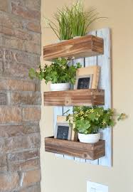 I just used a big drill bit to make three holes. Diy Wooden Wall Planter Sarah Joy