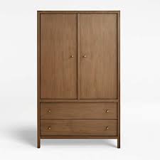 These contemporary closets offer large storage sections with metal hangrods at 68.25 height to store hanging items such as long jackets, dresses and blazers. Keane Driftwood Solid Wood Armoire Reviews Crate And Barrel