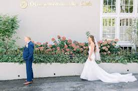 The great hall is truly a beacon on the lake. Marina Jesse Oconomowoc Lake Club Wedding Photographers Larissa Marie Photography