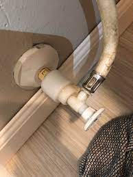 You'll not only break off the knob, but you can also break off the valve stem at the same time. How Do I Replace This Water Shut Off Valve For A Toilet That S Pvc Coming Out Of The Wall It Is Leaking At The Metal Part At The End Of The Hose