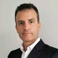 Malcolm Cowan 高馬勤 BSc Hons, C Eng, MIET