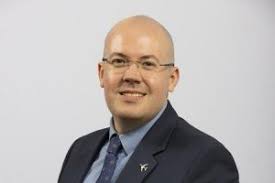 Framework CEO Andrew Redfern (right) and DHP George Akins (back right) with  Framework team building Akins House