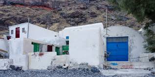 Manolas has small, picturesque houses painted in various colors. Thirassia Travel Tips Ferry Info Ferryhopper