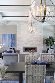 Our Award Winning Designers Specialize In Designing And Staging Local Model Homes The Robb Stuc Home Fireplace Contemporary Fireplace White Stone Fireplaces