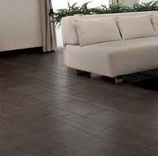 Creating consistency through their main floor, the couple also laid these tiles in their washroom, laundry room, nursery, and master bedroom. The Basics Of Wood Look Ceramic Tile