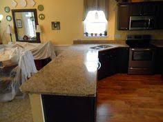 Giallo Ornamental Granite 4 24 13 Granite Countertops Installed In Mooresville Nc 40 60 S Dark Wood Kitchen Cabinets Wood Kitchen Cabinets Dark Wood Kitchens