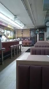 Coffee machines and trays with cups set on a table. Station Coffee Shop 1740 New York Ave Huntington Station Ny 11746 Usa